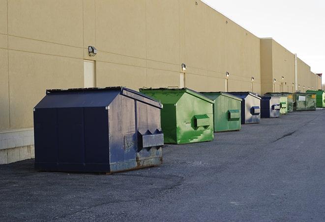 a crowd of dumpsters of all colors and sizes at a construction site in Caseyville IL